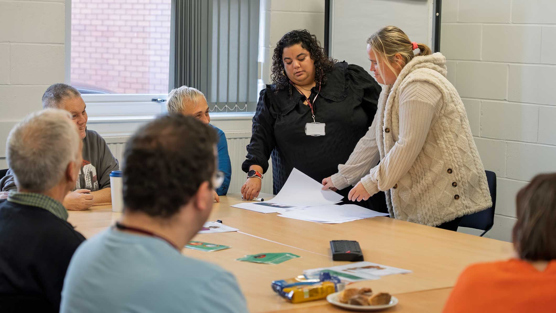 A photo of our Asking You team delivering training